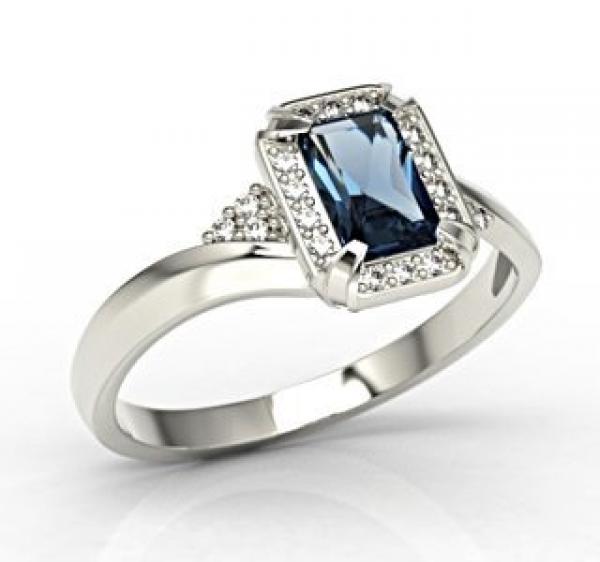 Pierścionek z białego złota z szafirem i diamentami 0,10 ct wzór LP-84B