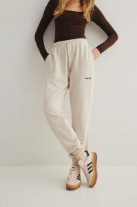 Spodnie typu jogger w kolorze LATTE MELANGE - AUSTIN-L