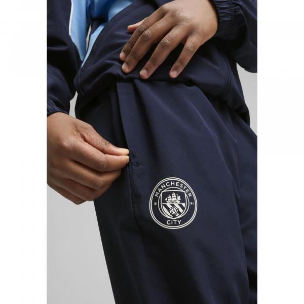 Młodzieżowe spodnie Manchester City ftblARCHIVE PUMA Navy Team Light Blue